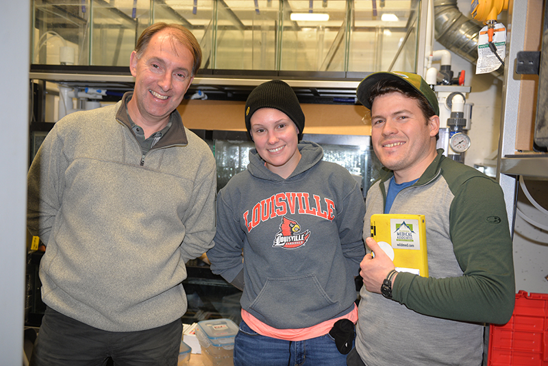 Dr. Mark Shrimpton, graduate student and field assistant Paige Wilson, Luc Turcotte in the lab