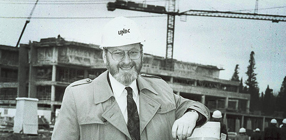 Geoffrey Weller in front of construction of the UNBC Prince George campus
