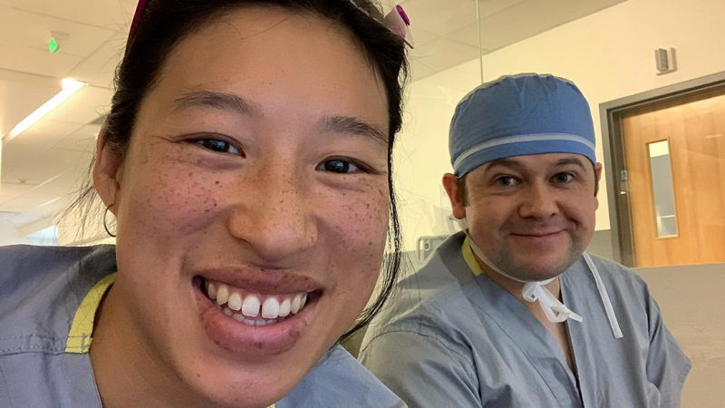A selfie of Jennifer Nguyen and Dr. Geoff Johnson in a hospital setting 