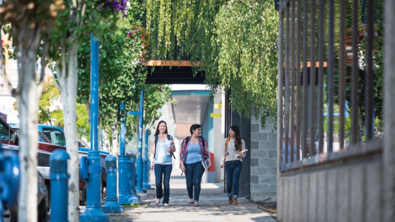 Students walking in a downtown community