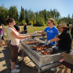 Students enjoy a year end barbeque.