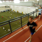 The elevated track overlooks the indoor field house in the Northern Sport Centre