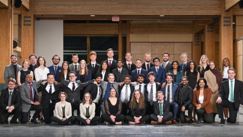 group photo featuring three rows of students